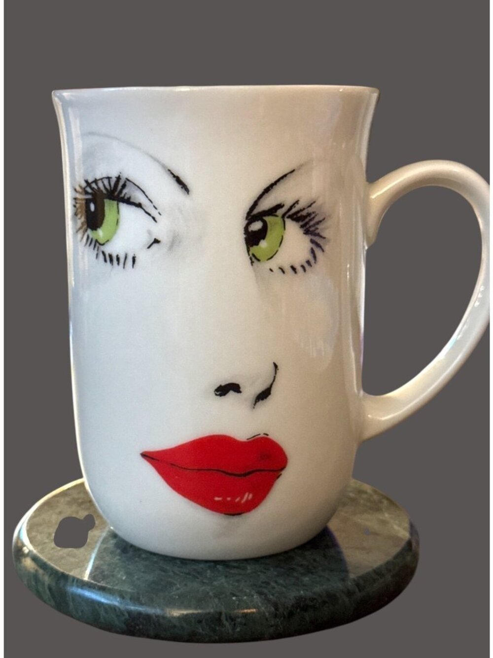 Vintage 1976 Royal Crown "Foxy Lady" ceramic mug featuring a retro pop art face